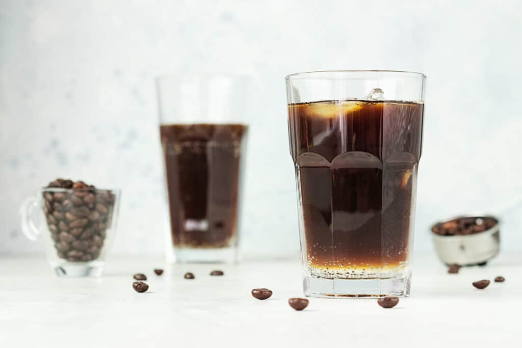 Two glasses with espresso tonic.